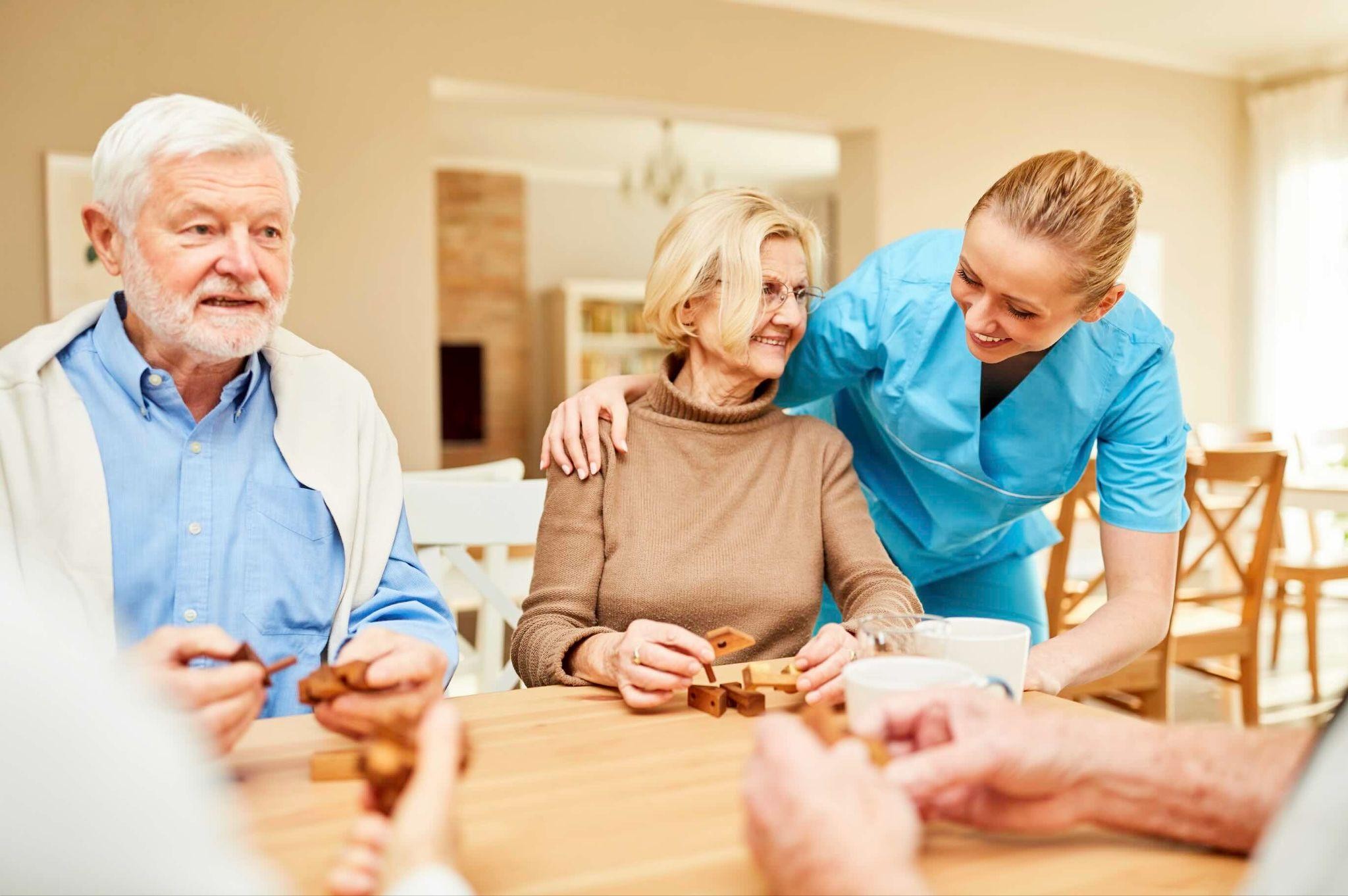 A live-in carer and client together at home