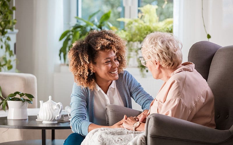 A carer supporting a client at home