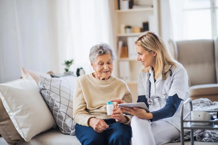 A carer supporting a client at home