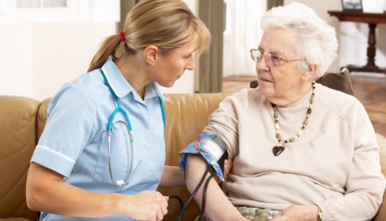 A carer supporting a client at home